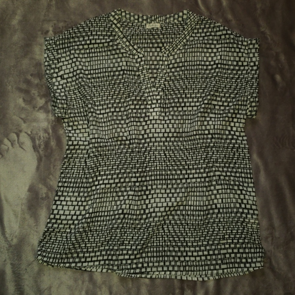 Sheer black and white patterned mock sleeve blouse